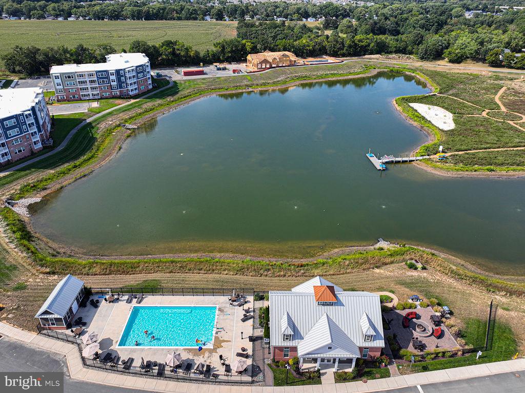 20141 Riesling Lane, Unit 106 Lewes, DE 19958 - Photo 28 of 31 an aerial view of a house with outdoor space swimming pool and outdoor seating