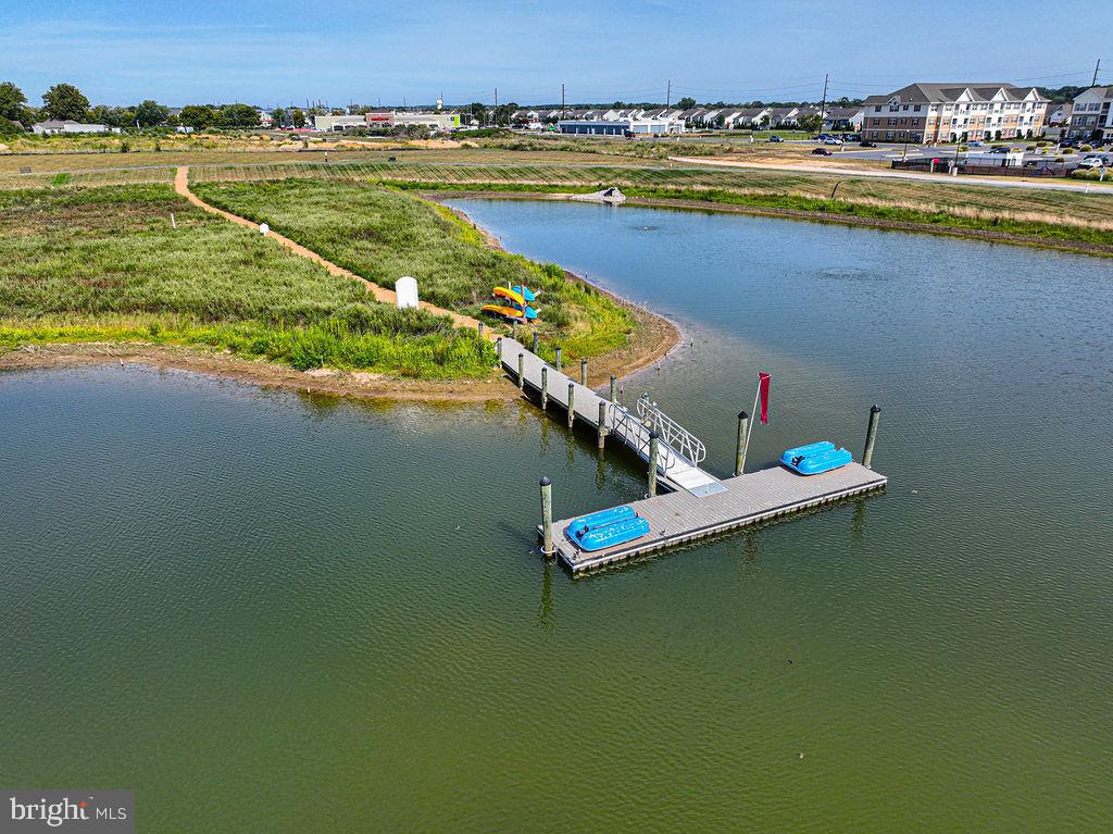 20141 Riesling Lane, Unit 106 Lewes, DE 19958 - Photo 31 of 31 a view of an ocean and beach