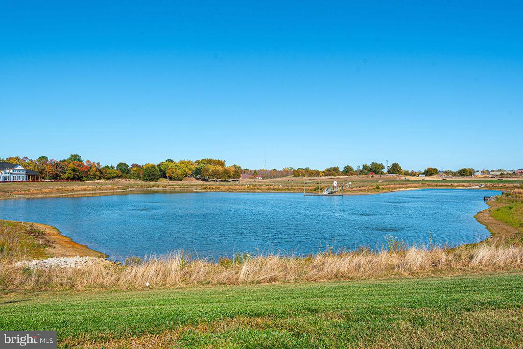 20141 Riesling Lane, Unit 106 Lewes, DE 19958 - Photo 4 of 31 a view of an ocean
