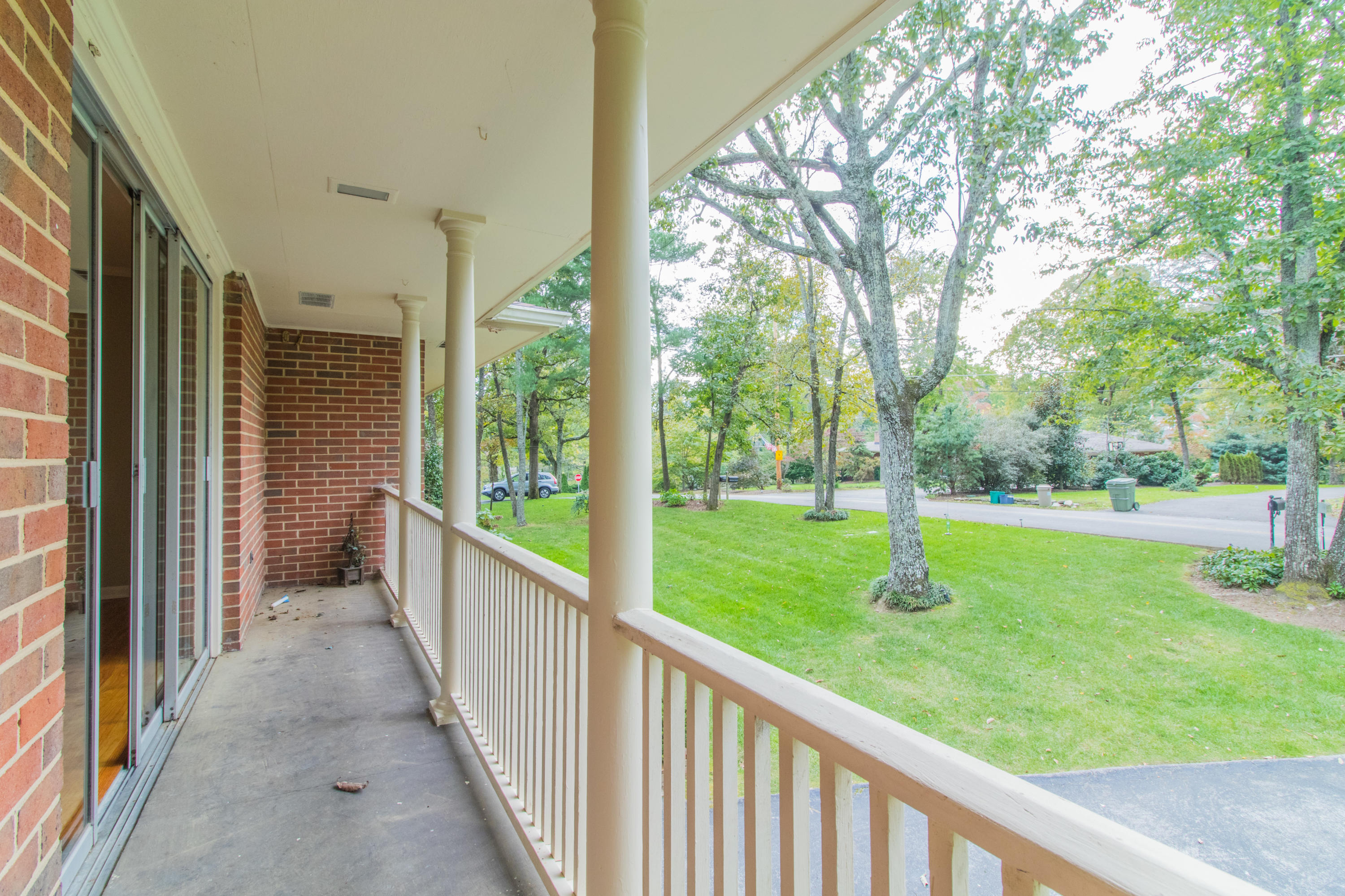 1305 Peter Pan Road Lookout Mountain, GA 30750 - Photo 25 of 30 Covered Rocking Chair Porch