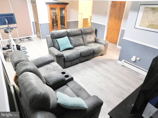a living room with furniture and a couch