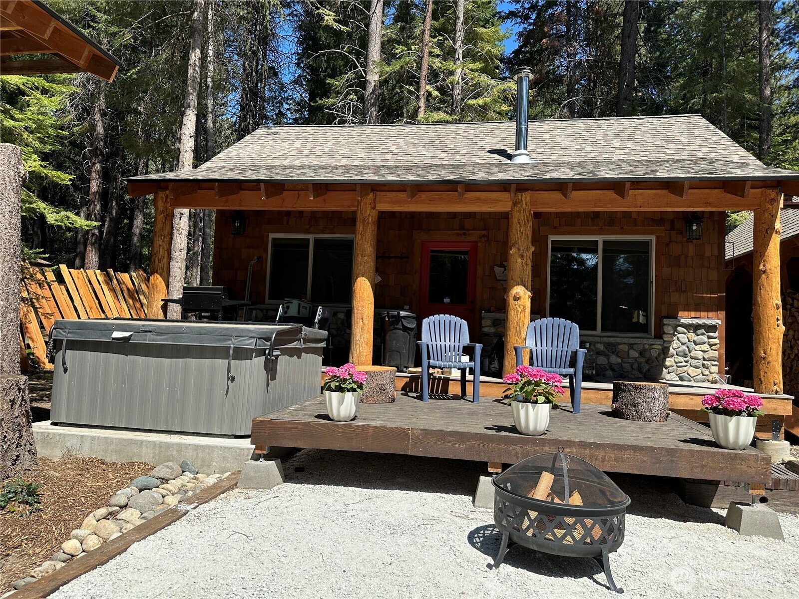 a view of outdoor kitchen and living room