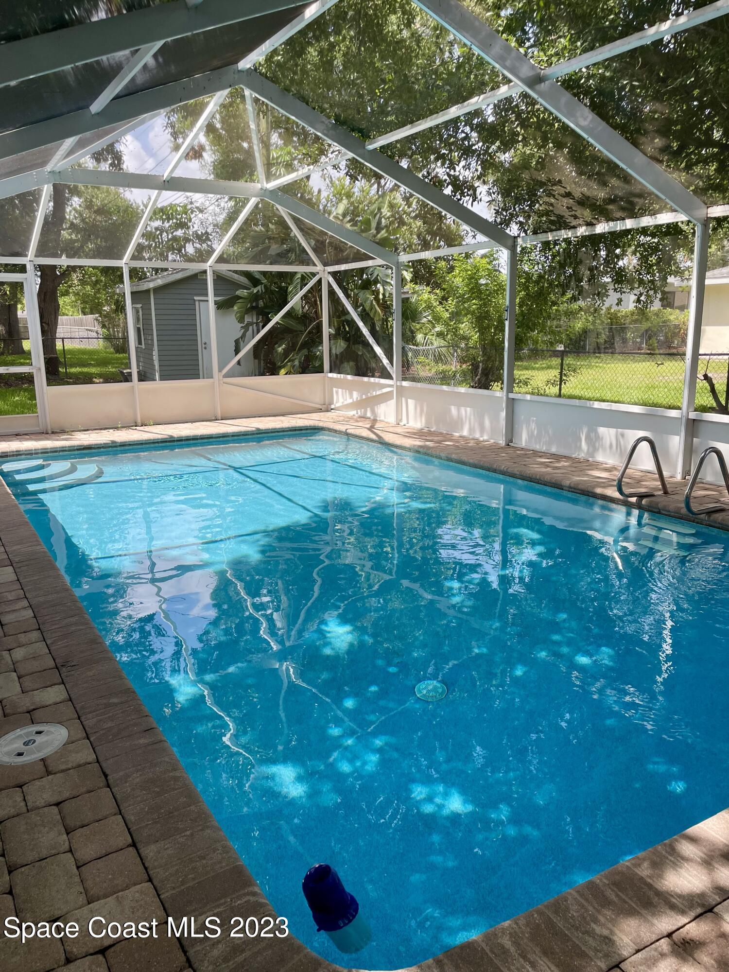 255 Lee Road Melbourne, FL 32904 - Photo 18 of 20 a view of a backyard
