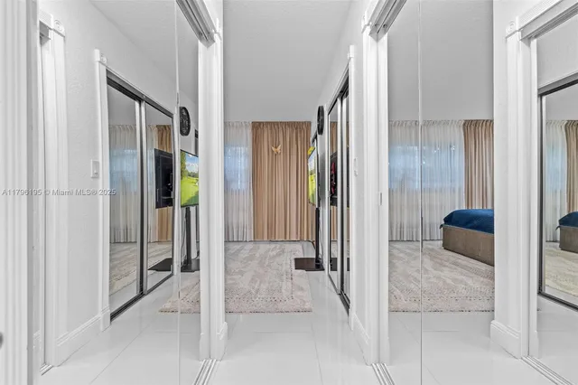 a bathroom with a tub and shower