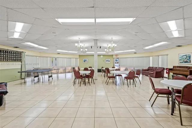 a view of city from balcony with outdoor seating