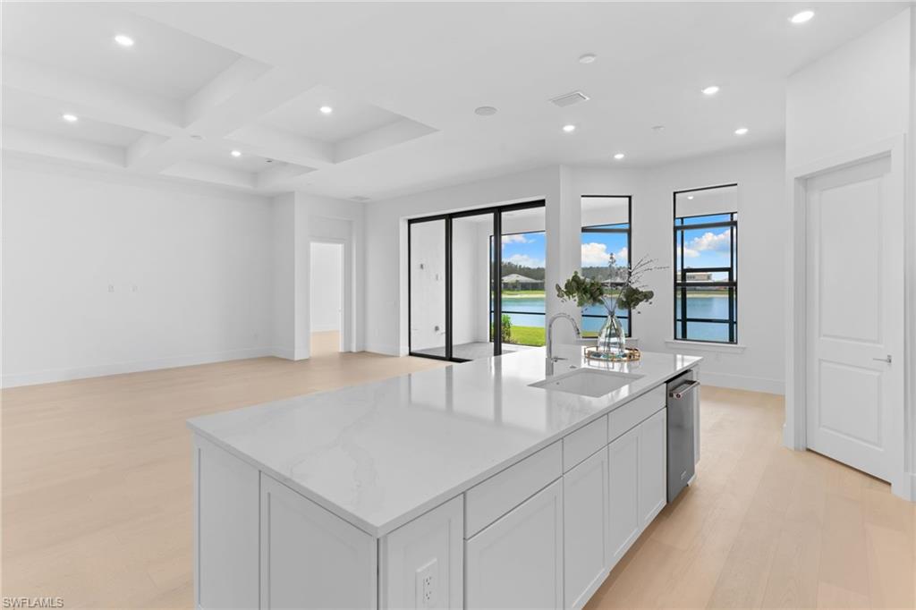 19084 Gentry Place Estero, FL 33928 - Photo 10 of 44 Views to the living room, screened lanai, and breakfast nook with bay windows