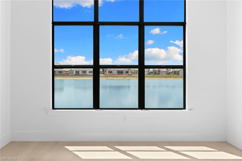 19084 Gentry Place Estero, FL 33928 - Photo 20 of 44 Pond Views laying in your Primary Suite