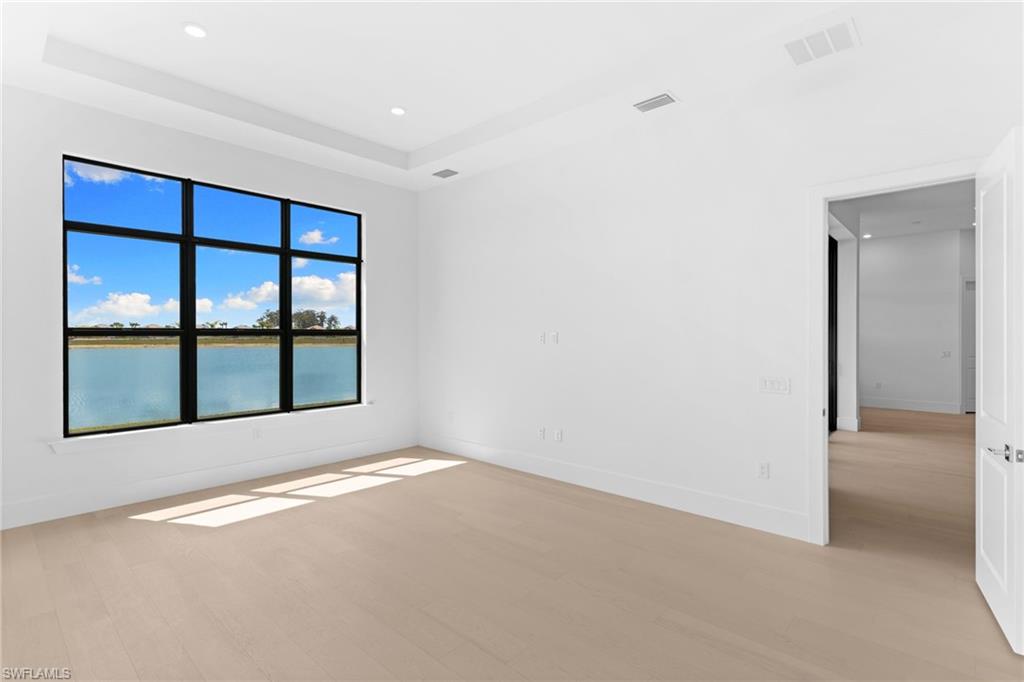 19084 Gentry Place Estero, FL 33928 - Photo 21 of 44 Recessed Lighting, Impact Windows and New Hardwood Flooring