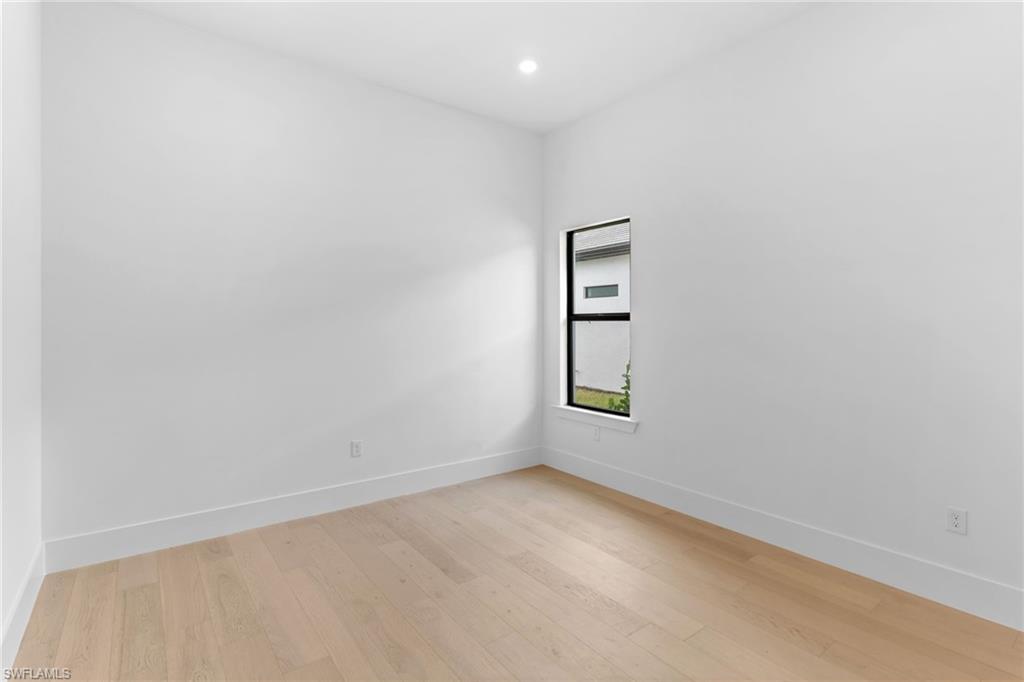 19084 Gentry Place Estero, FL 33928 - Photo 43 of 44 Third bedroom with adjacent full bath in split floor plan design