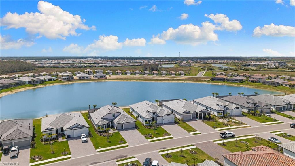 19084 Gentry Place Estero, FL 33928 - Photo 35 of 44 Beautiful curb appeal featuring Low-E windows and black Bermuda shutters