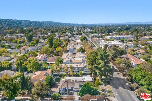 a view of a city with mountain