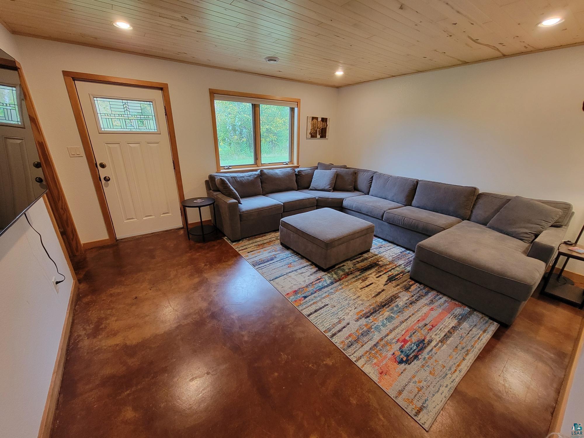 184 Fall River Road Grand Marais, MN 55604 - Photo 37 of 50 Living room with wood ceiling
