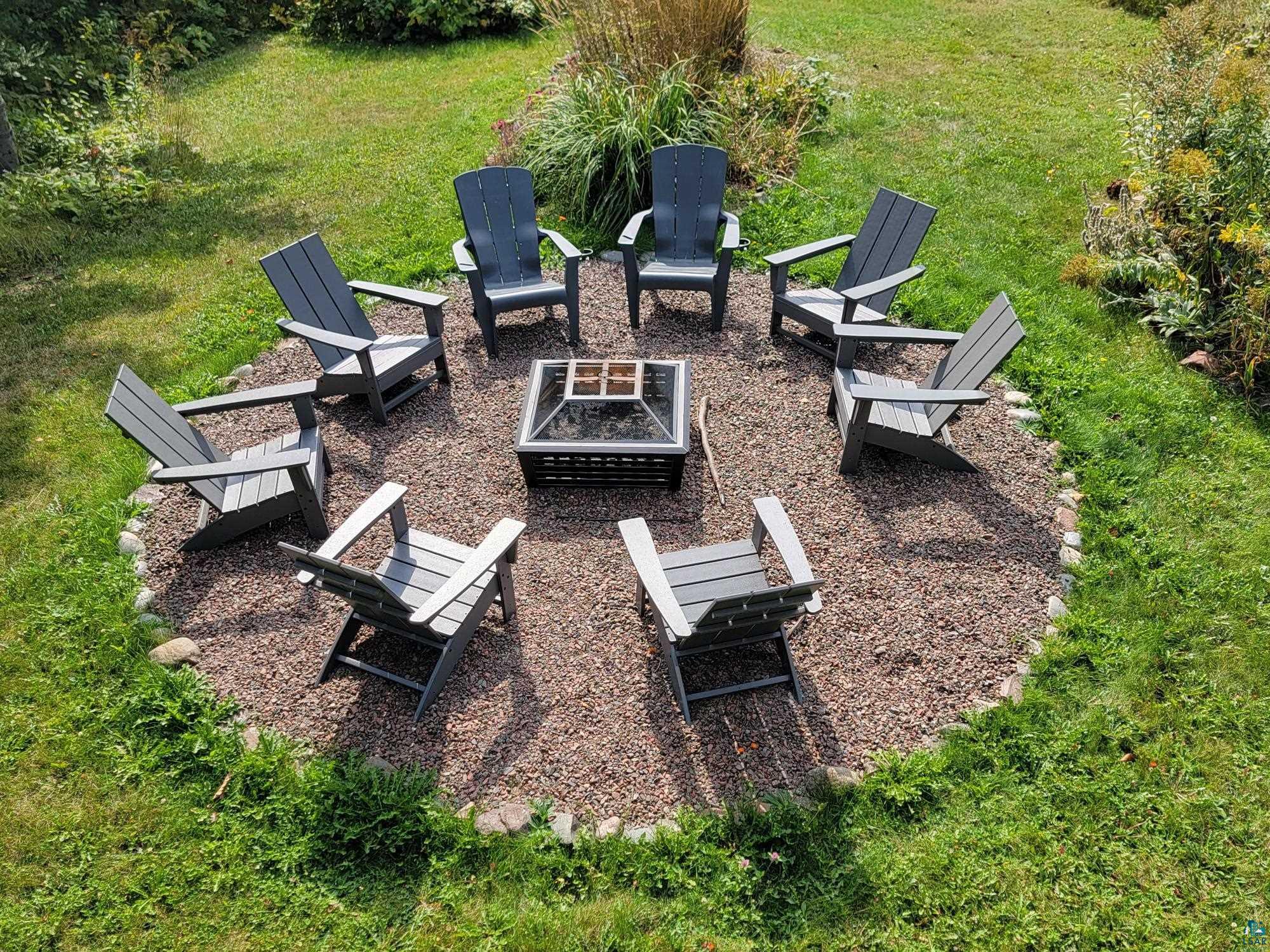 184 Fall River Road Grand Marais, MN 55604 - Photo 44 of 50 View of yard with an outdoor fire pit