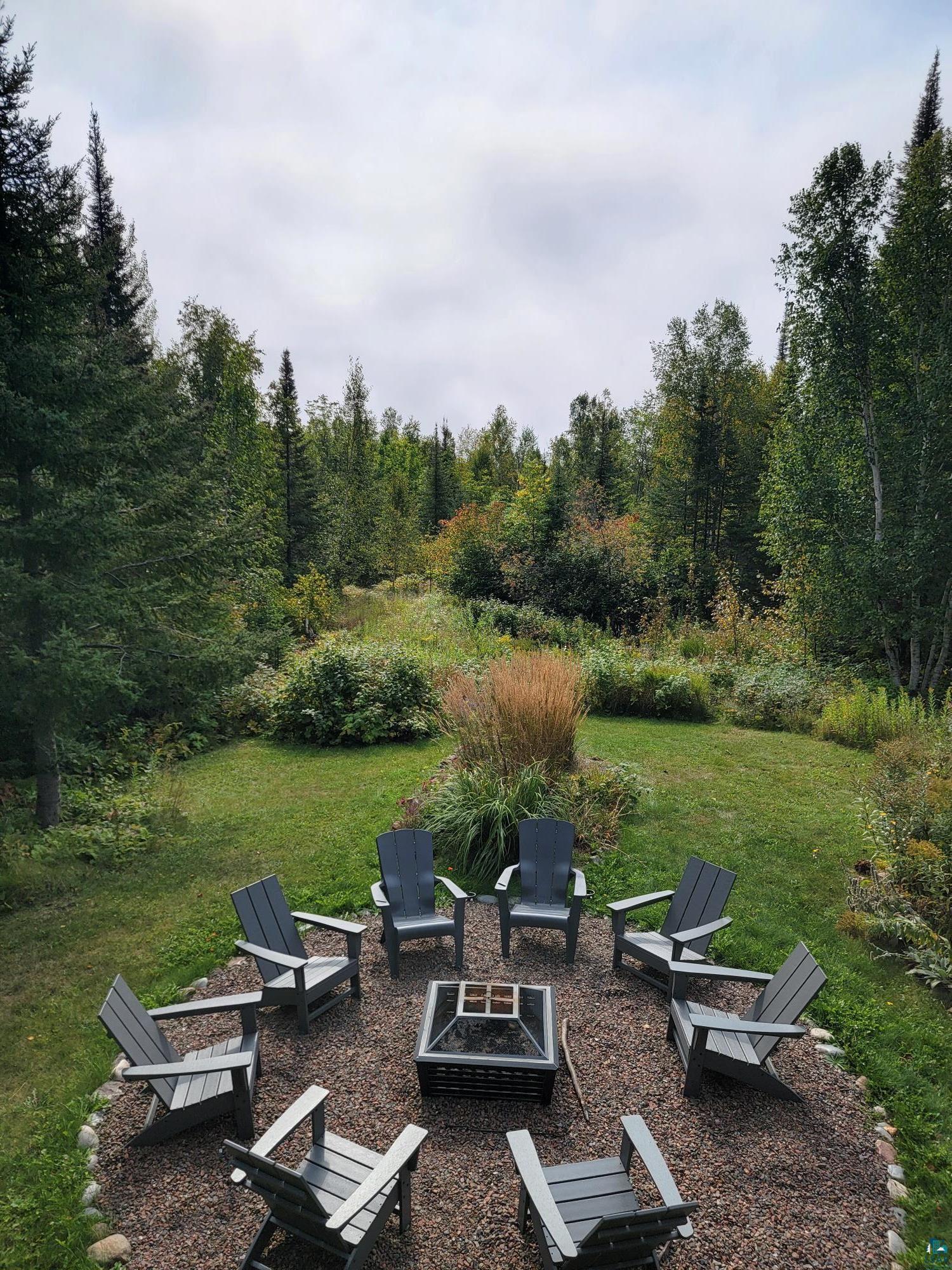 184 Fall River Road Grand Marais, MN 55604 - Photo 45 of 50 View of yard with a fire pit