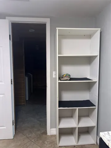 a view of an empty walk in closet