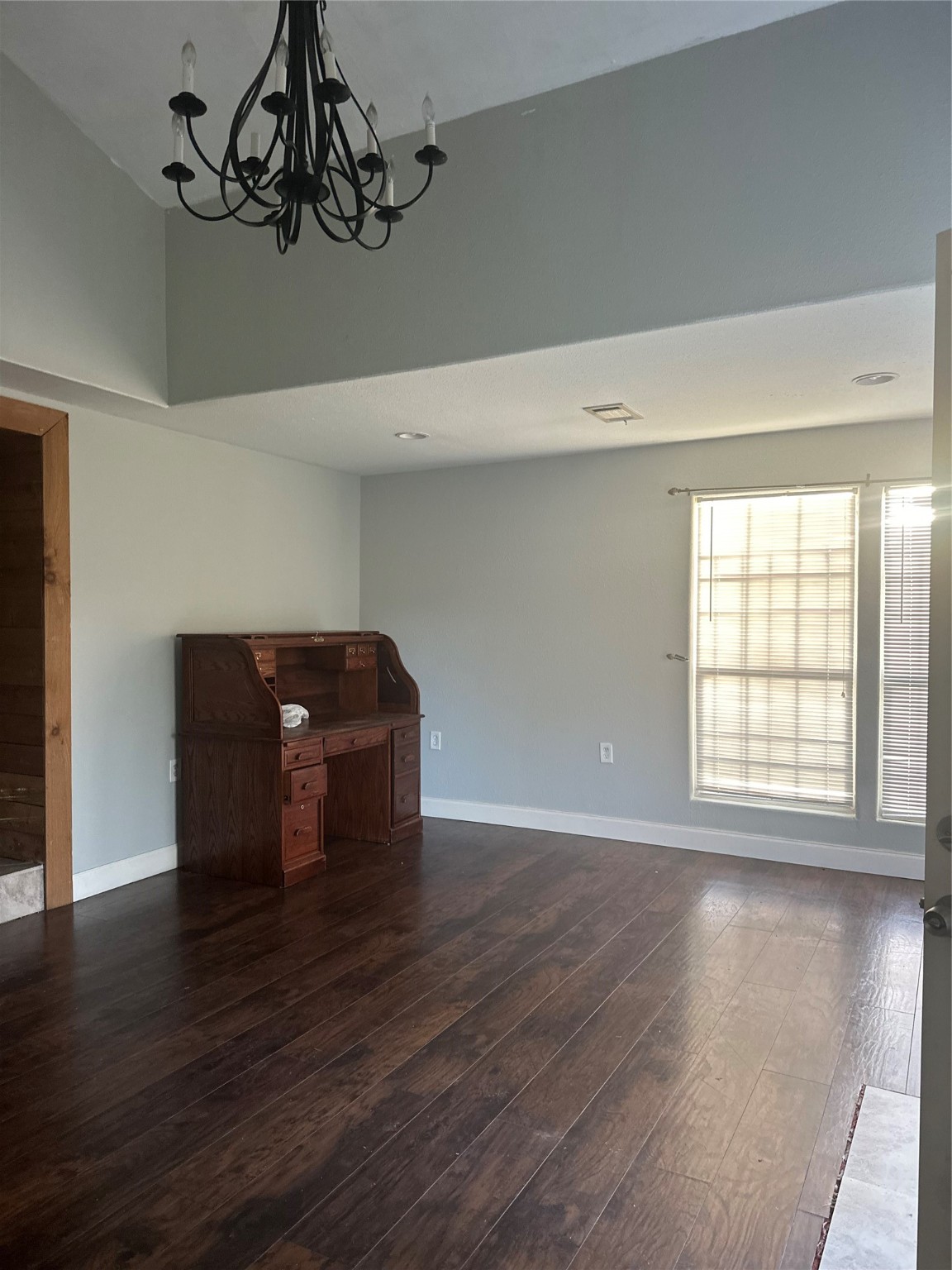 650 Our Road Shepherd, TX 77371 - Photo 4 of 19 a view of empty room with wooden floor and windows