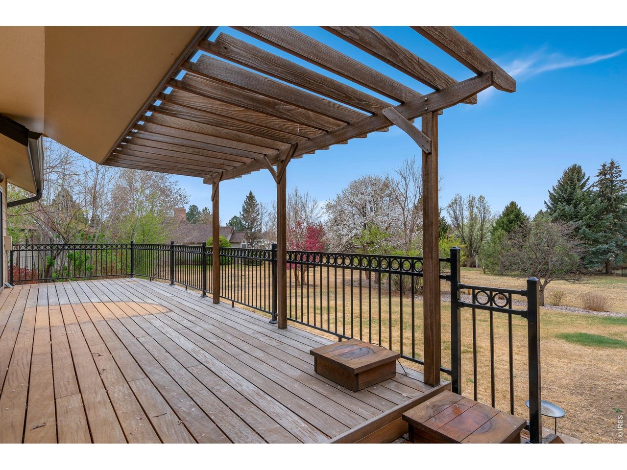 1819 Linden Lake Road Fort Collins, CO 80524 - Photo 36 of 49 a view of deck with wooden floor and outdoor seating