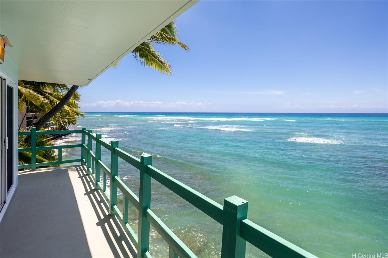 2957 Kalakaua Avenue, Unit 418 Honolulu, HI 96815 - Photo 16 of 25 a view of a balcony and an ocean