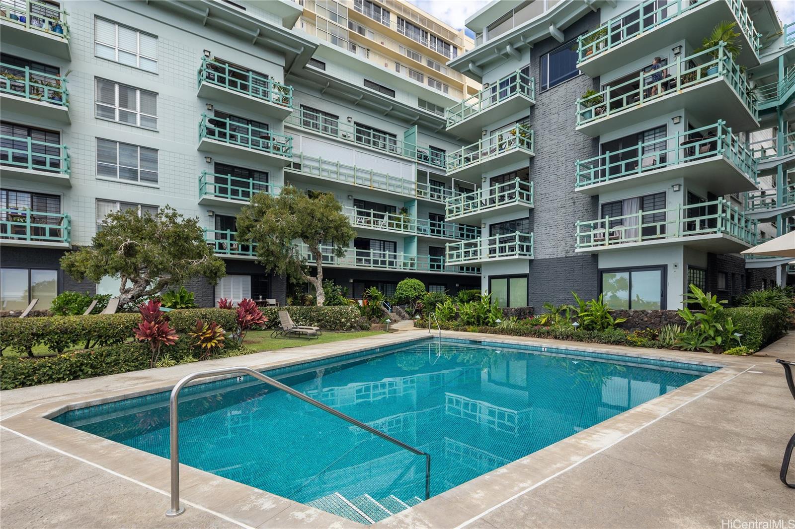 2957 Kalakaua Avenue, Unit 418 Honolulu, HI 96815 - Photo 22 of 25 a view of pool with outdoor seating and plants