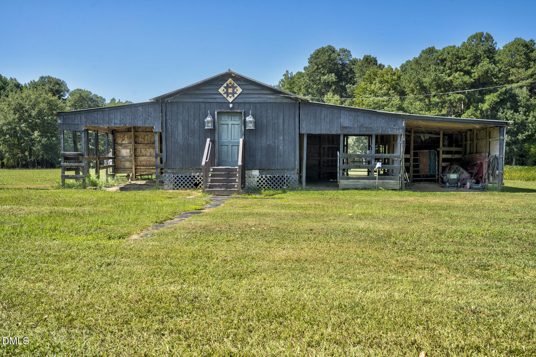 6515 Tonya Road Elm City, NC 27822 - Photo 25 of 52 a view of a house with yard and sitting area