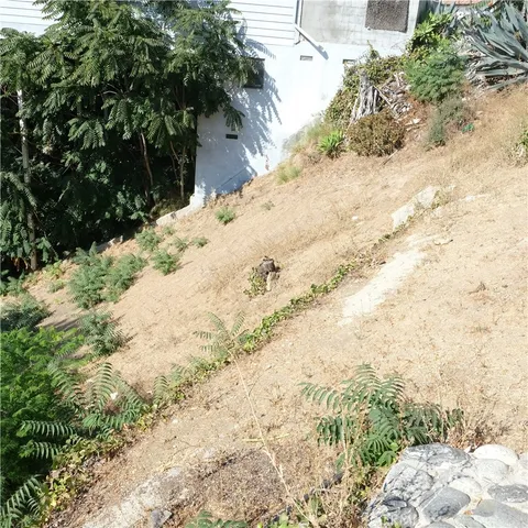 a view of a house with a mountain