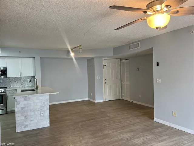 a car parked in front of a house