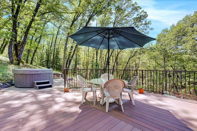 a view of backyard with green space