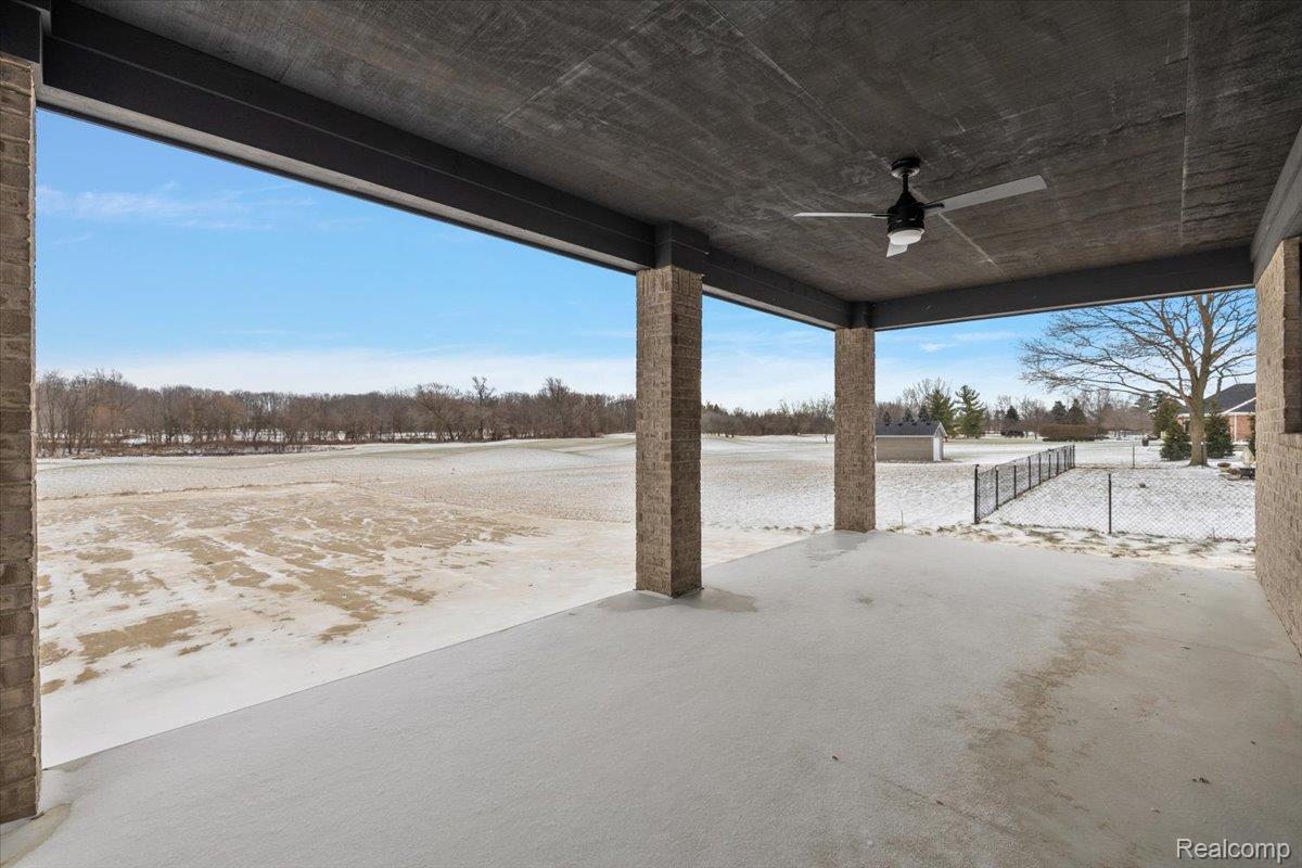 53650 Romeo Plank Road Macomb, MI 48042 - Photo 49 of 64 Large covered patio with ceiling fan