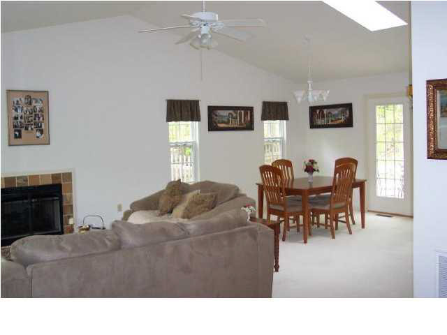 39 Oak Grove Road Palmyra, VA 22963 - Photo 3 of 5 a living room with furniture and a fireplace