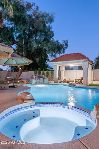 a front view of a house with swimming pool