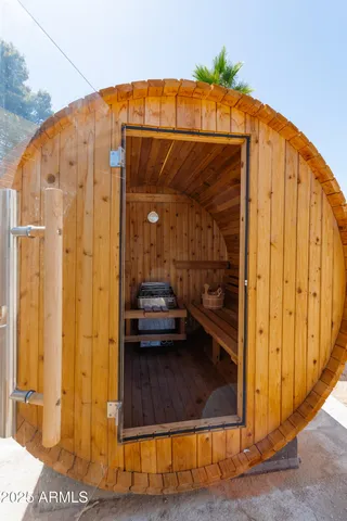 a bathroom with a shower and a sink
