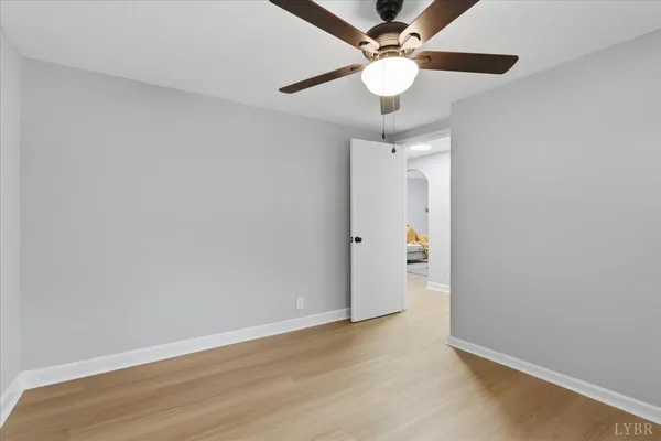 a view of a yard with trees