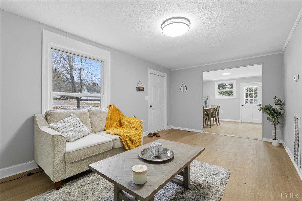 503 Prospect Road Hurt, VA 24563 - Photo 4 of 33 a living room with furniture and wooden floor