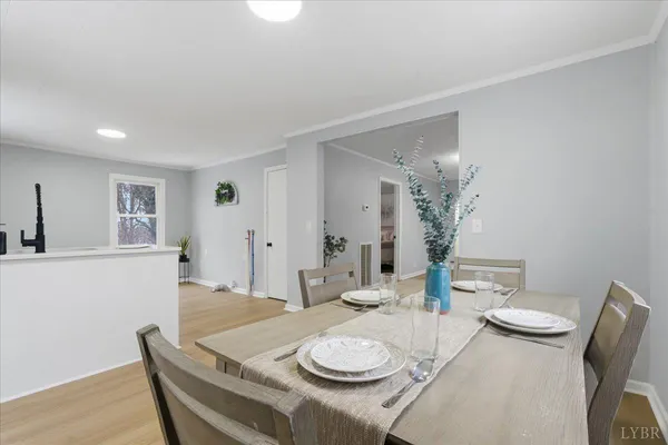 a view of living room with wooden floor