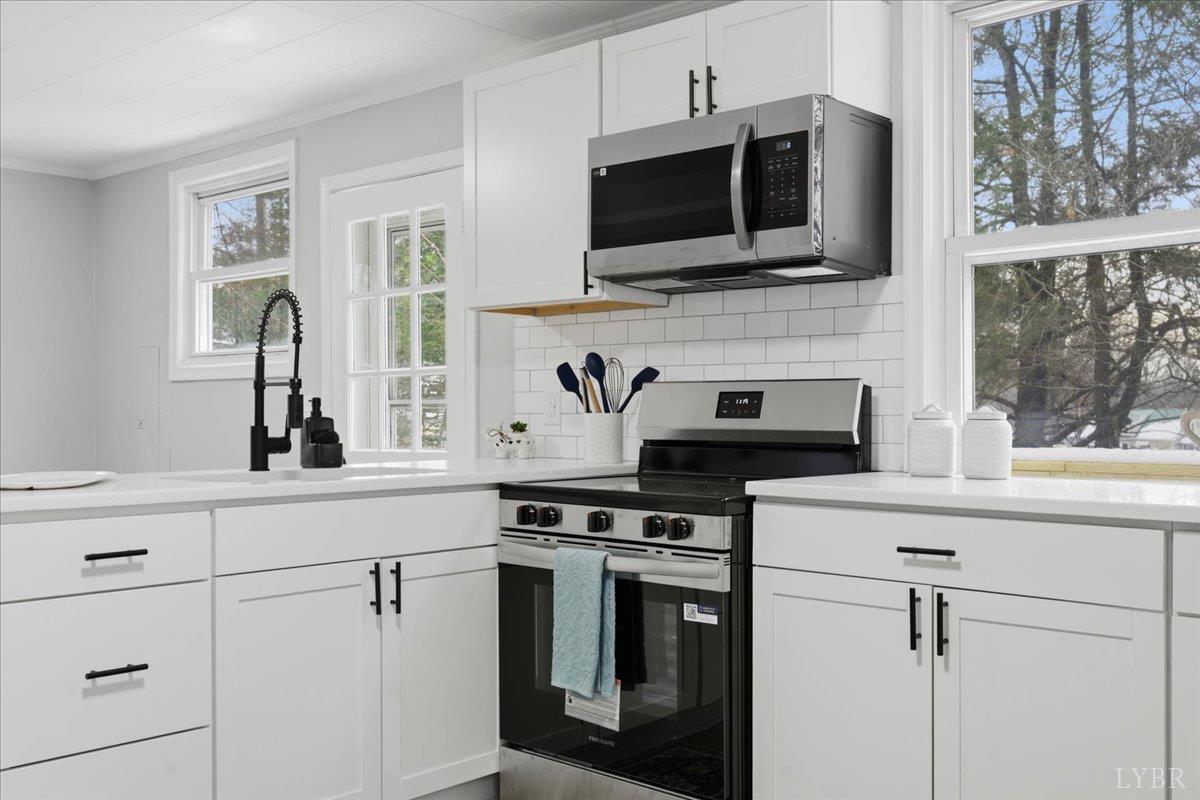 503 Prospect Road Hurt, VA 24563 - Photo 10 of 33 a kitchen with cabinets stainless steel appliances and a counter space