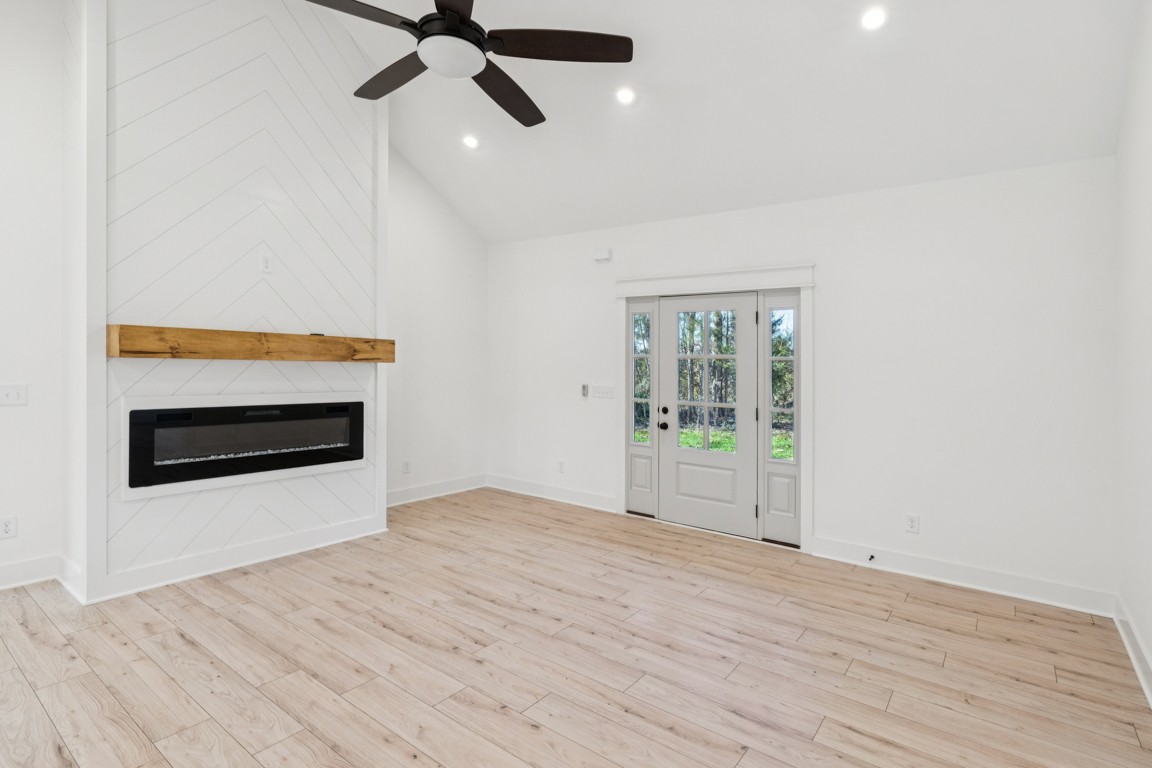3666 Clark Road Lewisburg, TN 37091 - Photo 4 of 21 a view of empty room with wooden floor and fan