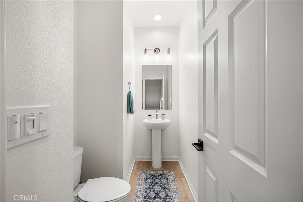 329 North Standard Avenue Santa Ana, CA 92701 - Photo 20 of 34 a bathroom with a toilet and a shower