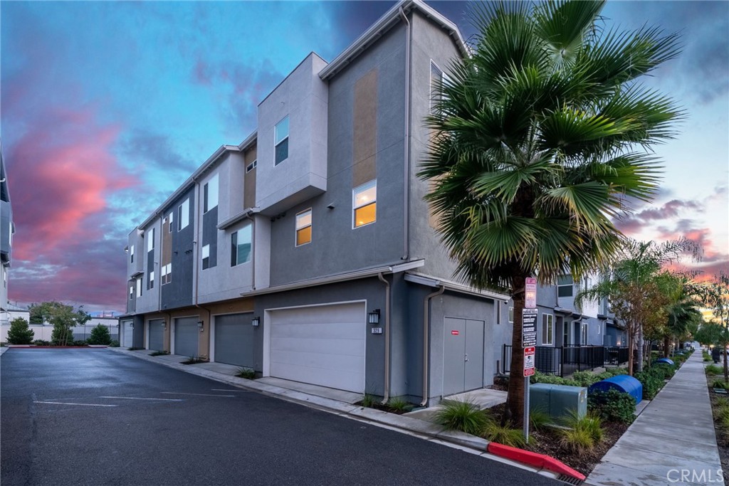 329 North Standard Avenue Santa Ana, CA 92701 - Photo 2 of 34 a front view of house with yard and green space