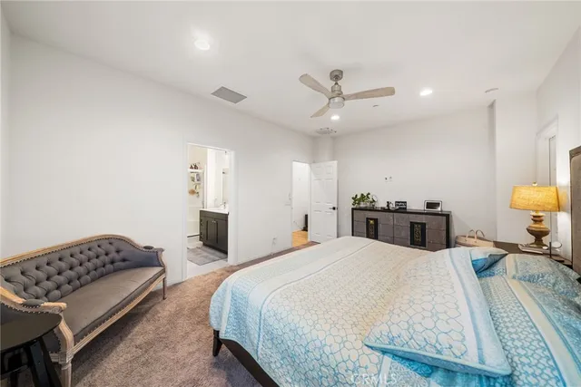 a bedroom with a workspace