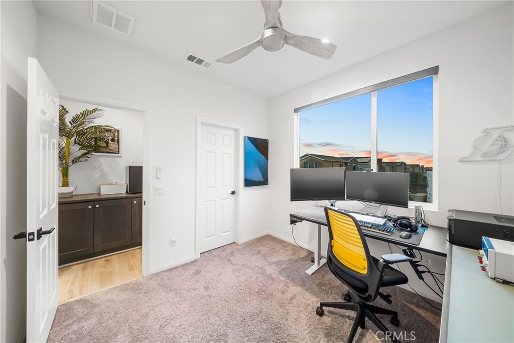 329 North Standard Avenue Santa Ana, CA 92701 - Photo 23 of 34 a bedroom with a workspace