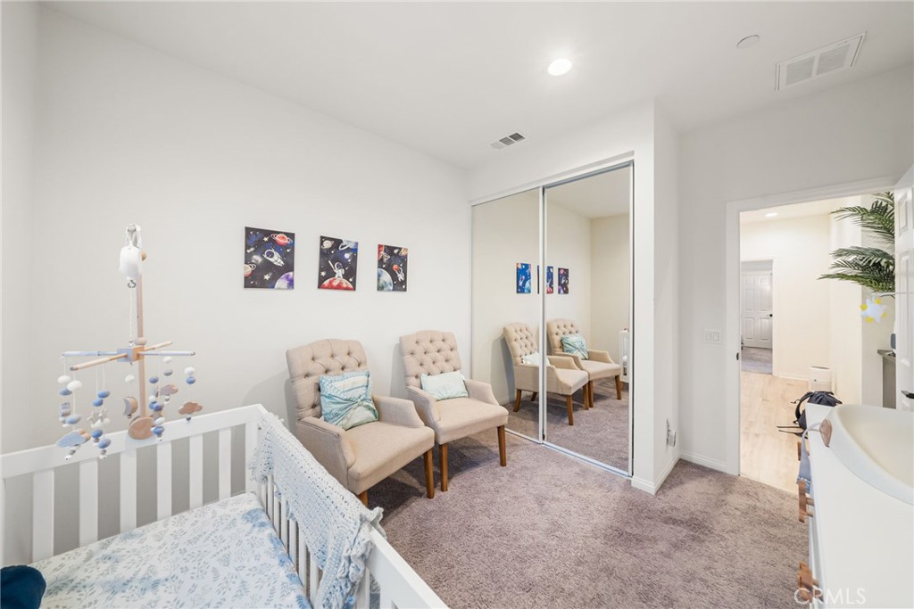 329 North Standard Avenue Santa Ana, CA 92701 - Photo 33 of 34 a living room with furniture and a large window