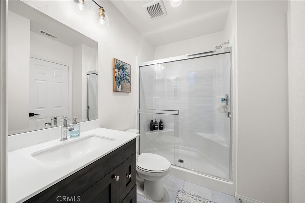 329 North Standard Avenue Santa Ana, CA 92701 - Photo 34 of 34 a bathroom with a sink toilet and shower