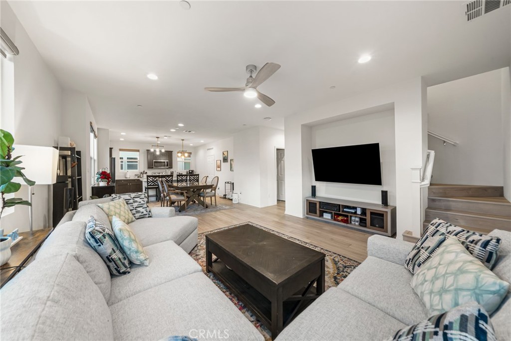 329 North Standard Avenue Santa Ana, CA 92701 - Photo 6 of 34 a living room with furniture and a flat screen tv