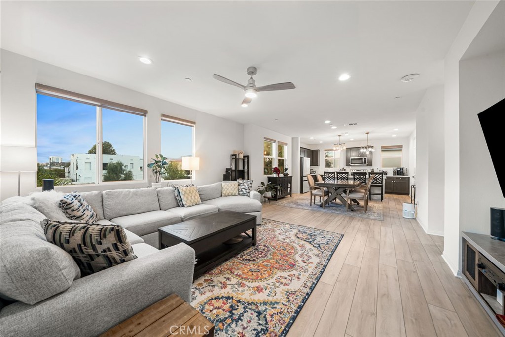 329 North Standard Avenue Santa Ana, CA 92701 - Photo 8 of 34 a living room with furniture and a wooden floor