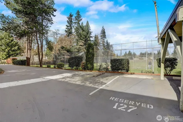 a view of road with a building in the background