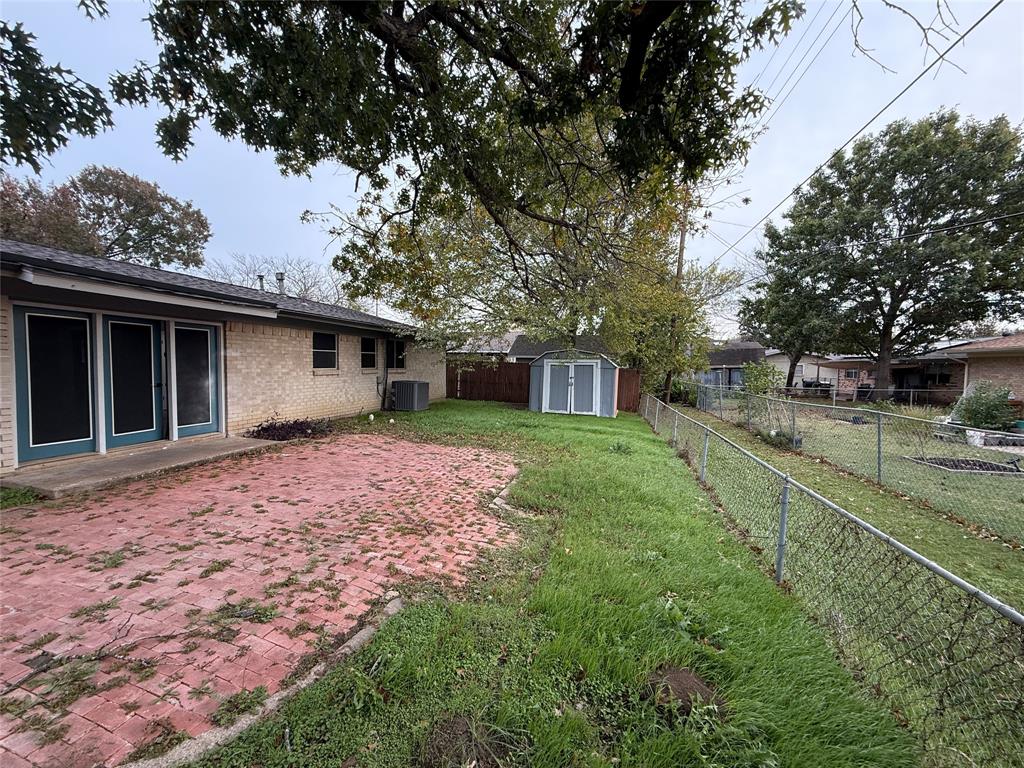 2847 West Rochelle Road Irving, TX 75062 - Photo 14 of 14 a front view of a house with garden