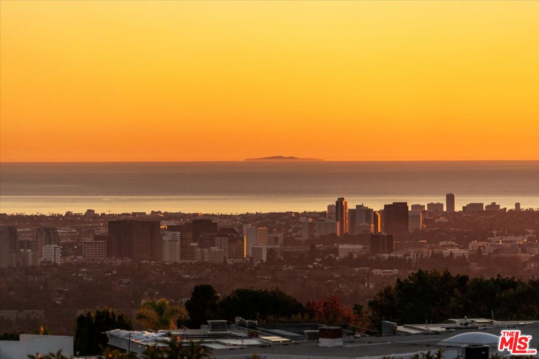 1740 Carla Ridge Beverly Hills, CA 90210 - Photo 1 of 36 a view of a city