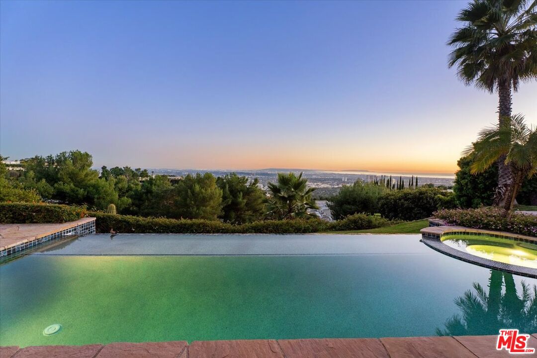 1740 Carla Ridge Beverly Hills, CA 90210 - Photo 16 of 36 a view of swimming pool and lake view