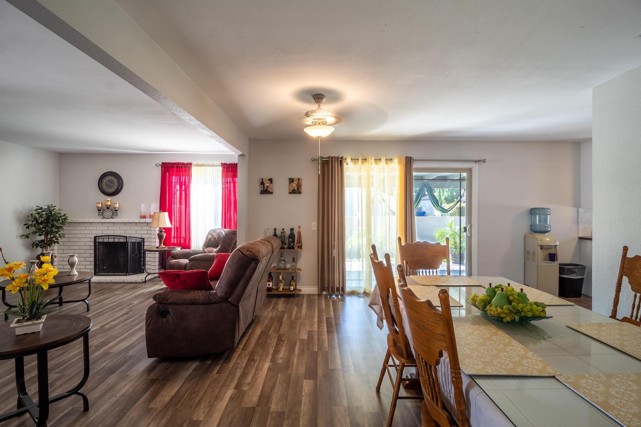 6875 Crest Avenue Riverside, CA 92503 - Photo 7 of 31 a living room with fireplace furniture and a wooden floor