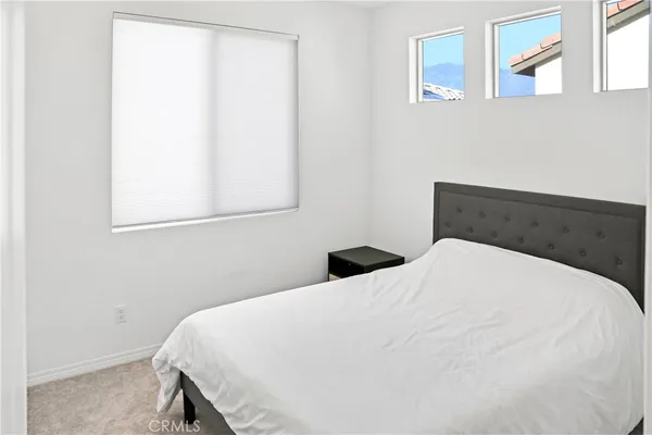 a bathroom with a sink a mirror a vanity and bathtub